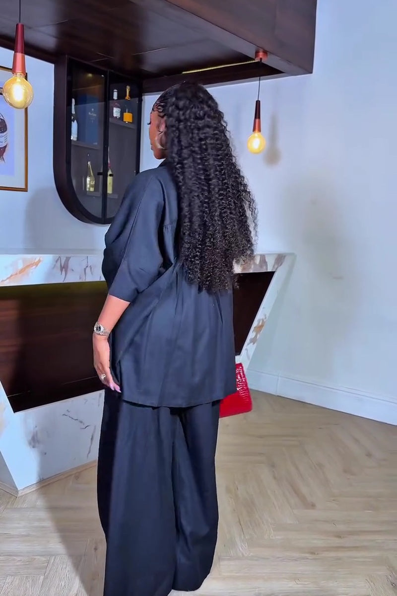 Black oversized shirt and wide-leg pants two-piece set, back view